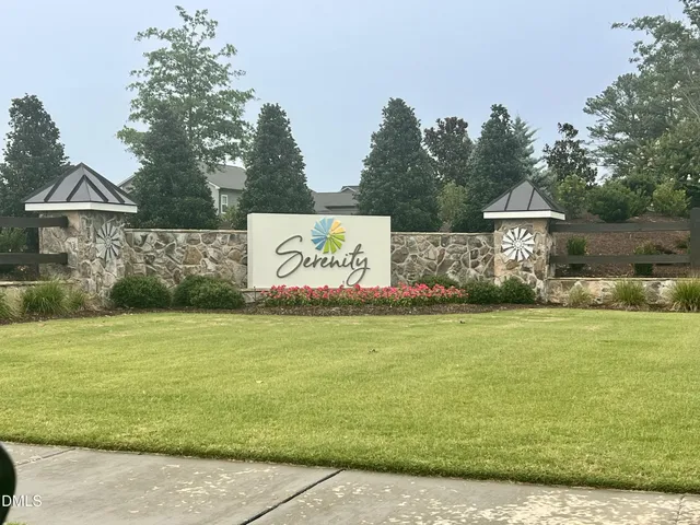 a view of a swimming pool with an outdoor seating