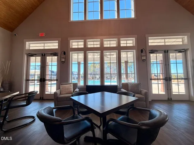 a terrace with outdoor seating and city view