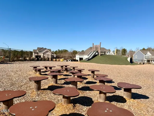 a view of a water fountain and a floor to ceiling window and an ocean view
