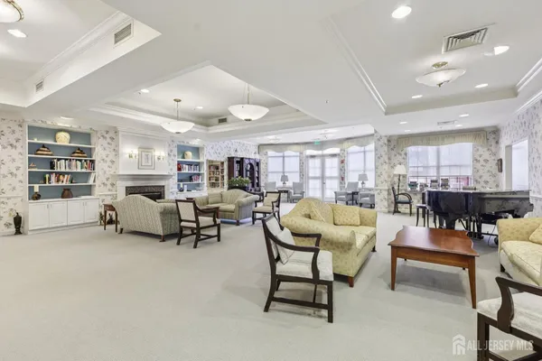 a living room with furniture and a table