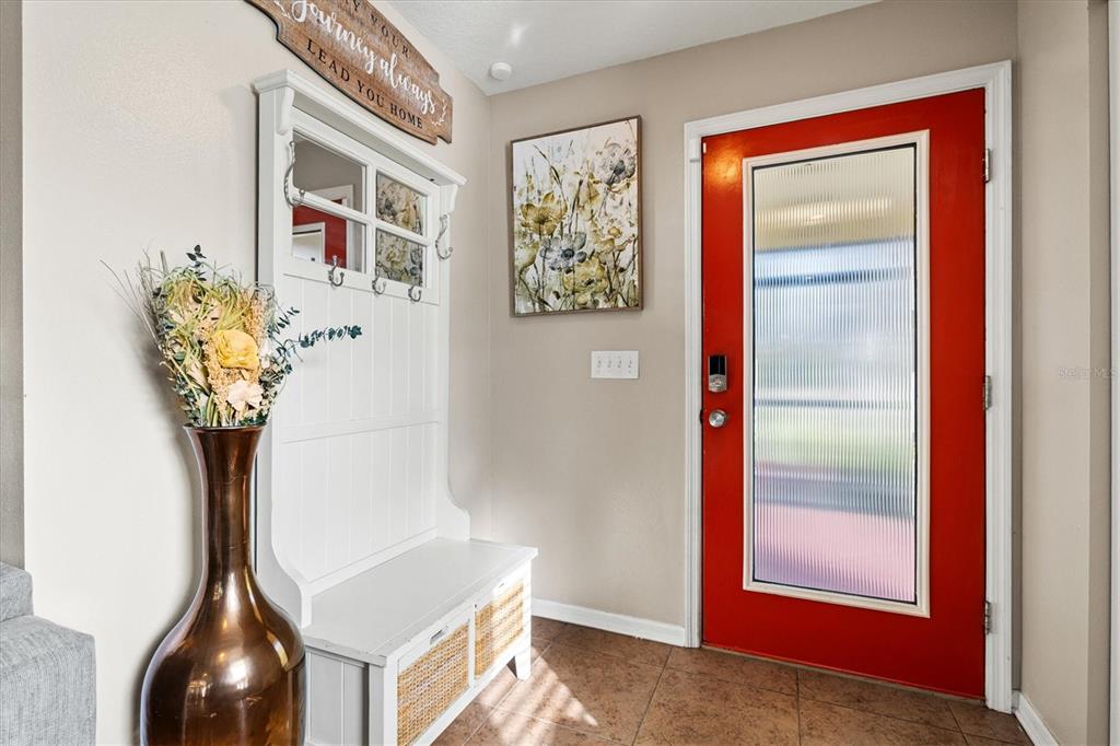 5213 Moon Shell Drive Apollo Beach, FL 33572 - Photo 11 of 69 a view of hallway with paintings on the wall