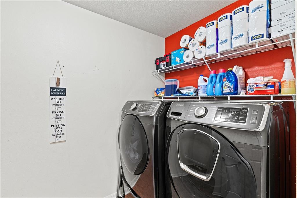 5213 Moon Shell Drive Apollo Beach, FL 33572 - Photo 27 of 69 a utility room with dryer and washer