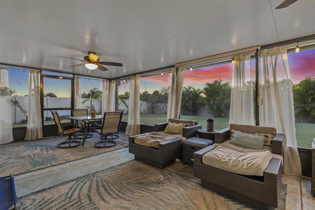 5213 Moon Shell Drive Apollo Beach, FL 33572 - Photo 28 of 69 a living room with furniture and large windows