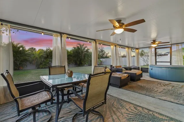 a view of a house with backyard and garden