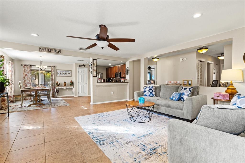 5213 Moon Shell Drive Apollo Beach, FL 33572 - Photo 3 of 69 a living room with furniture and wooden floor
