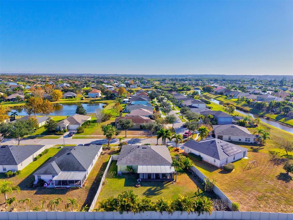 5213 Moon Shell Drive Apollo Beach, FL 33572 - Photo 34 of 69 an aerial view of residential houses with outdoor space and swimming pool
