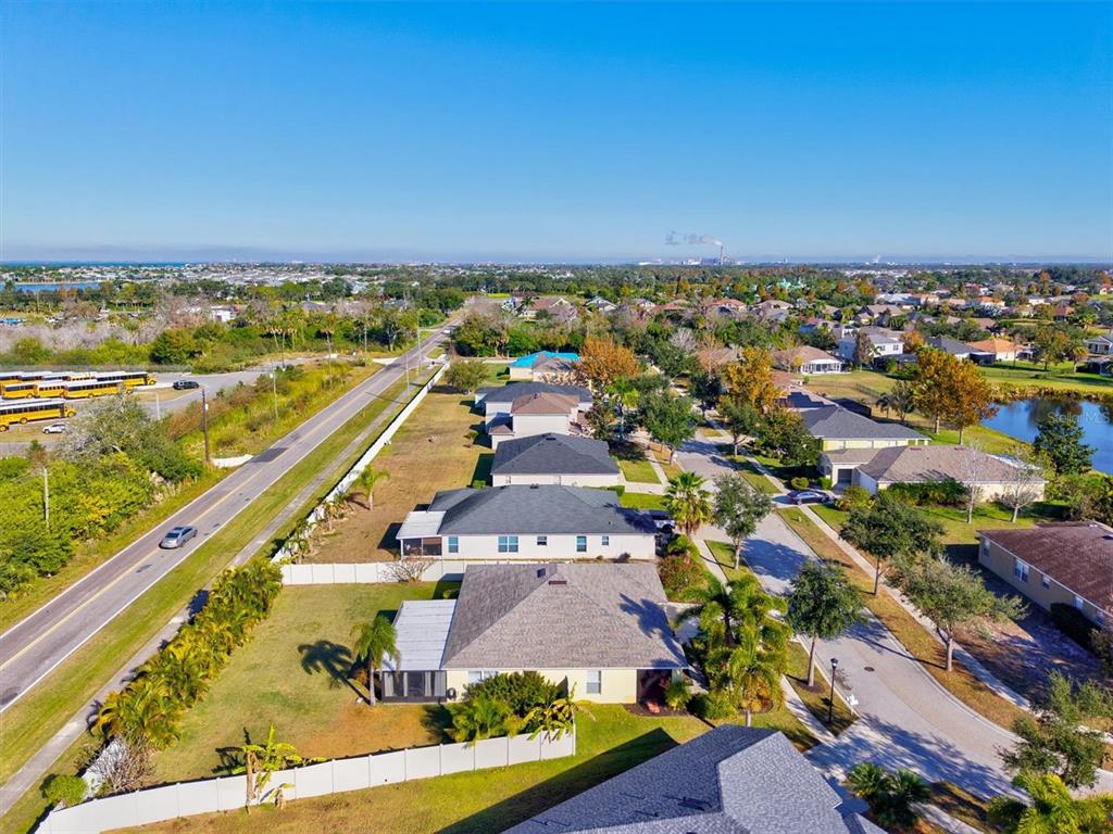 5213 Moon Shell Drive Apollo Beach, FL 33572 - Photo 35 of 69 an aerial view of residential building and lake