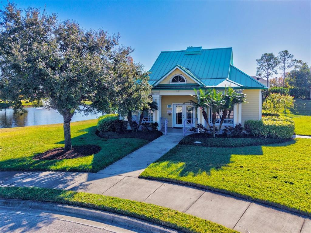 5213 Moon Shell Drive Apollo Beach, FL 33572 - Photo 46 of 69 a view of a house with swimming pool yard and outdoor seating