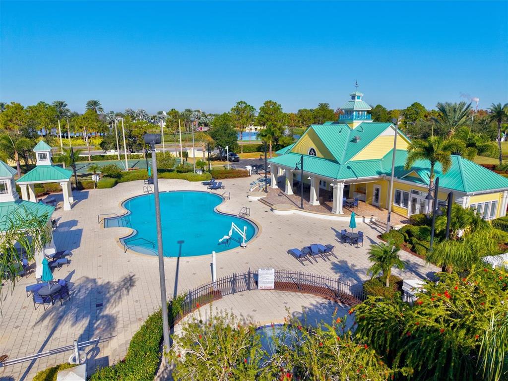 5213 Moon Shell Drive Apollo Beach, FL 33572 - Photo 50 of 69 an aerial view of residential houses with outdoor space and swimming pool