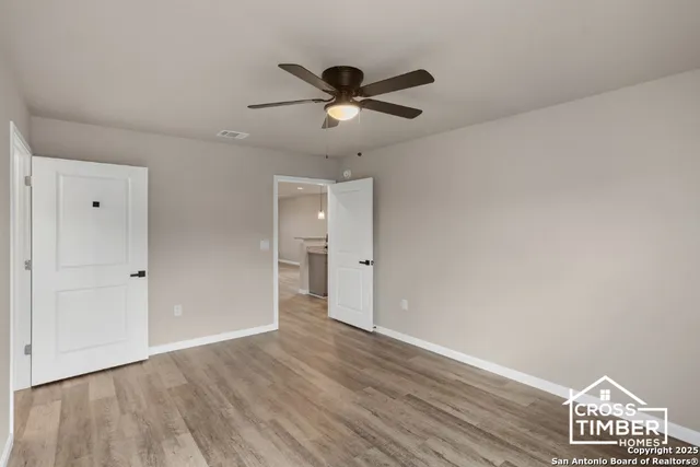 a view of an empty room and window