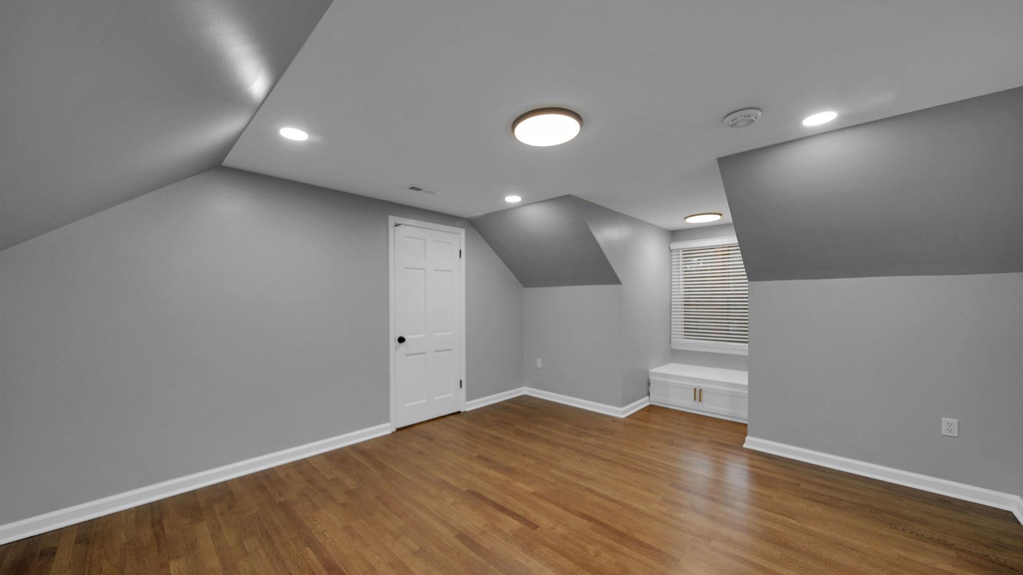5256 Collingwood Road Memphis, TN 38117 - Photo 35 of 40 Additional living space with vaulted ceiling, light wood-type flooring, and recessed lighting