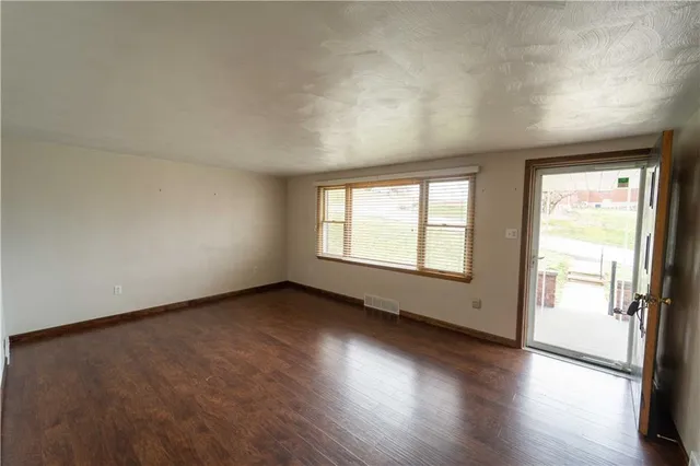 an empty room with a window