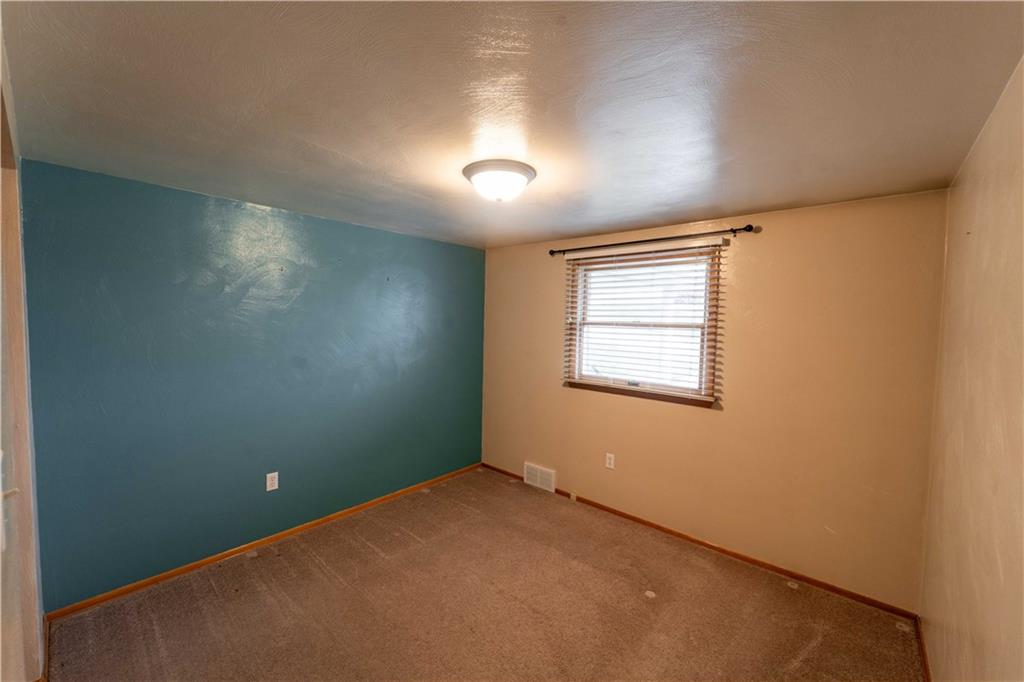 199 Spruce Street Mount Pleasant, PA 15666 - Photo 12 of 23 an empty room with a window