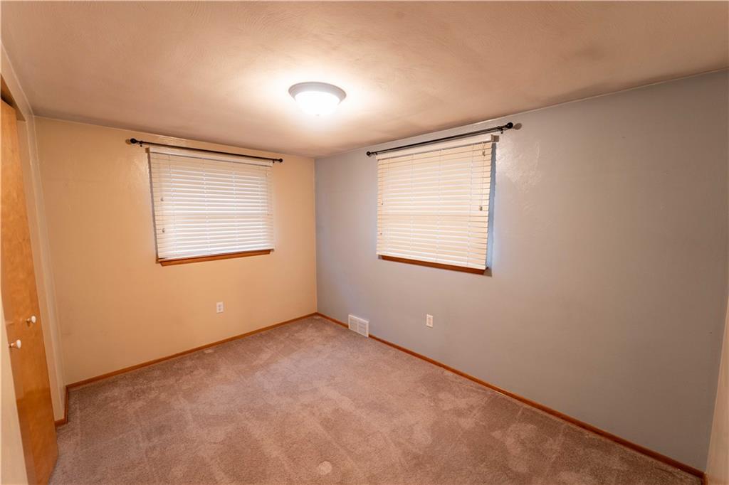 199 Spruce Street Mount Pleasant, PA 15666 - Photo 13 of 23 an empty room with windows