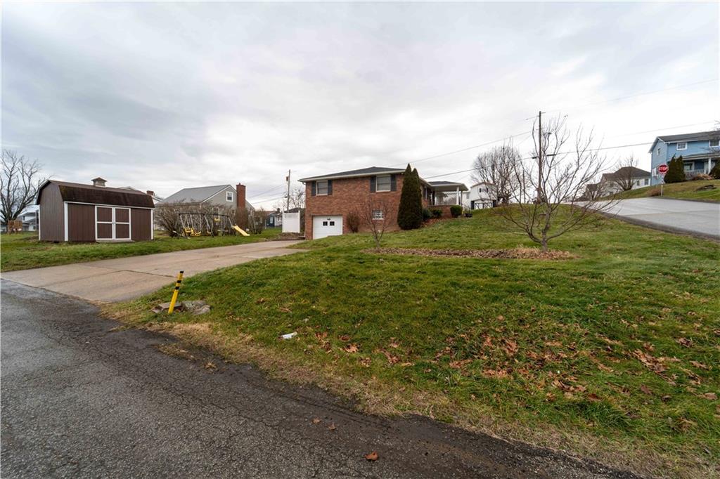 199 Spruce Street Mount Pleasant, PA 15666 - Photo 4 of 23 a view of a town with barn house