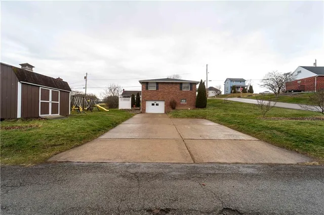 front view of a house with an outdoor space