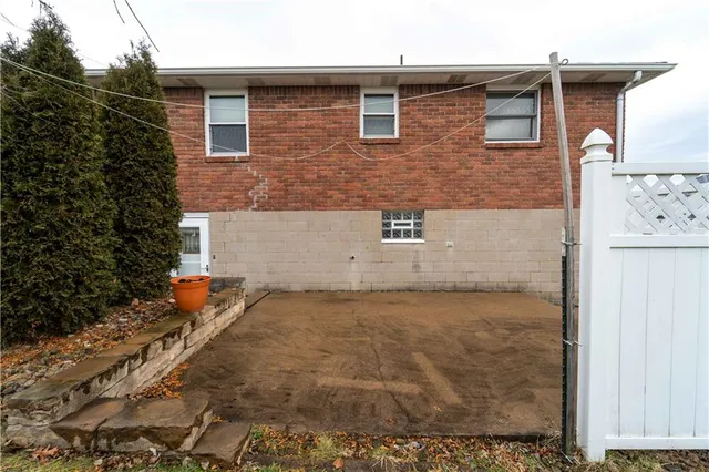a large white refrigerator freezer sitting in a kitchen