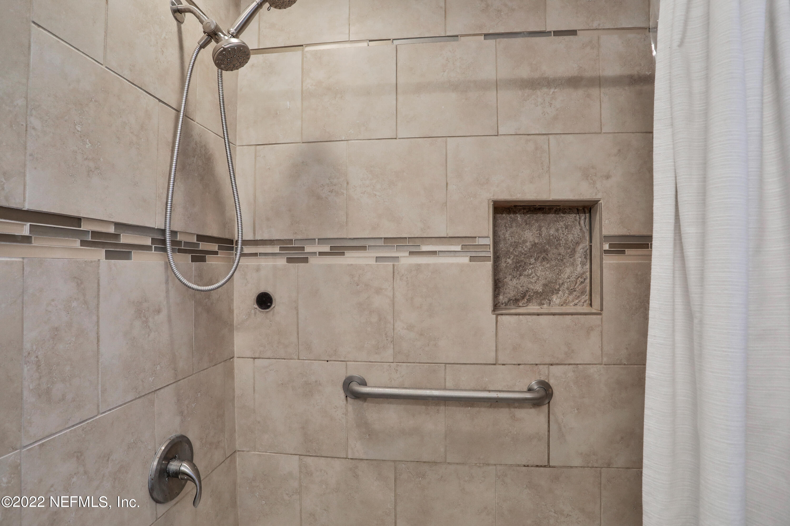 6435 Temple Road Jacksonville, FL 32217 - Photo 25 of 38 a bathroom with a shower