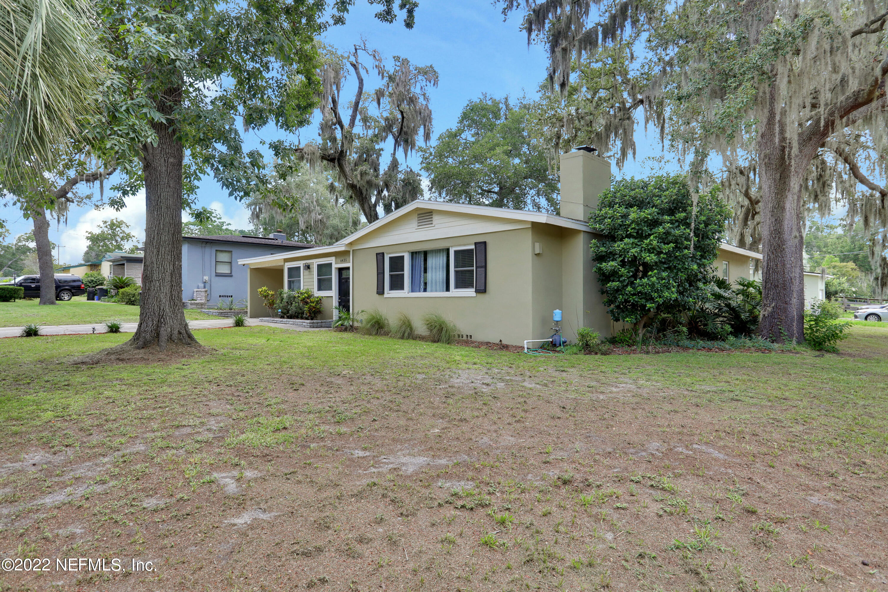 6435 Temple Road Jacksonville, FL 32217 - Photo 32 of 38 a house with trees in the background