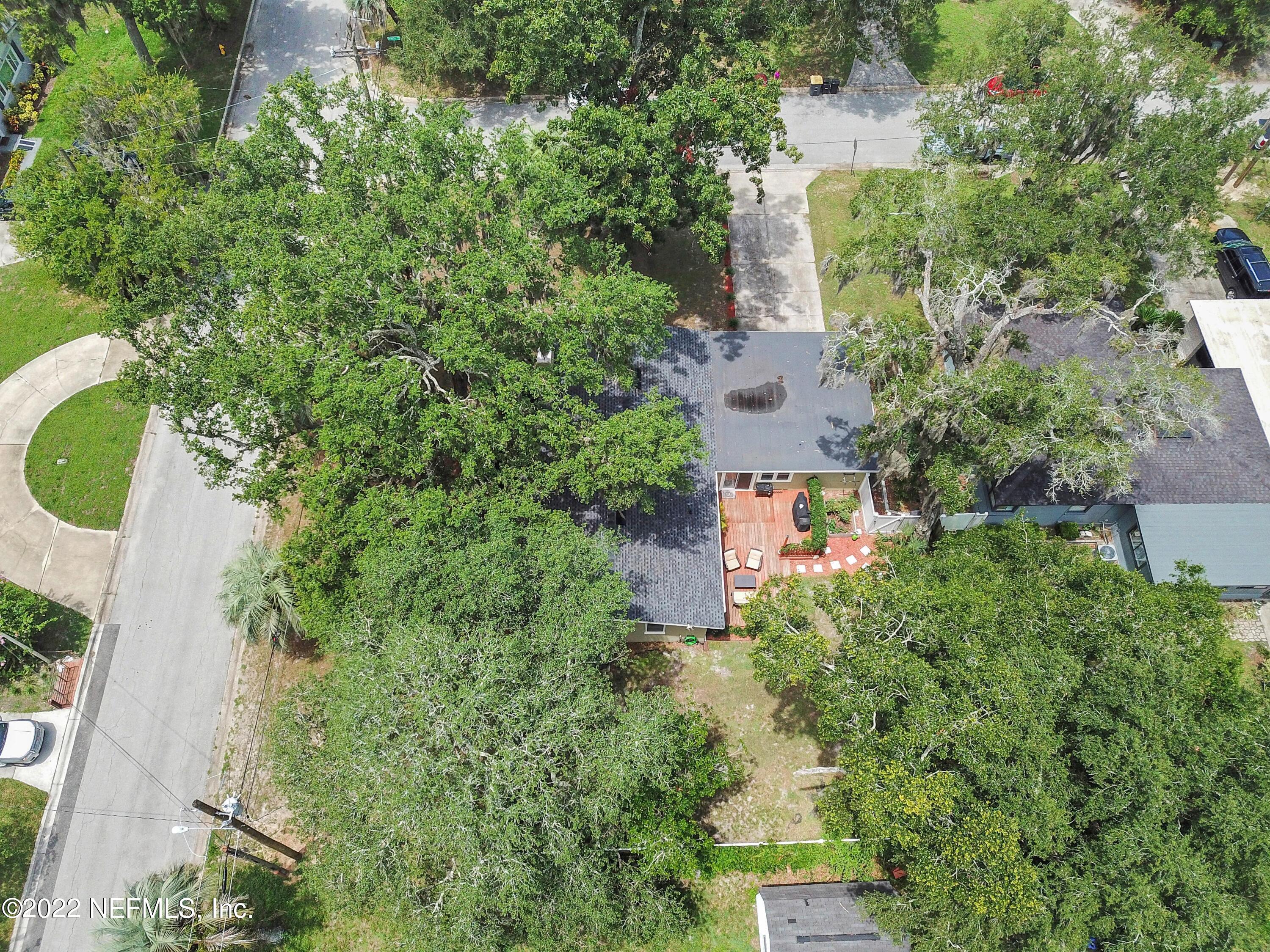 6435 Temple Road Jacksonville, FL 32217 - Photo 36 of 38 an aerial view of a house with a yard and lake view