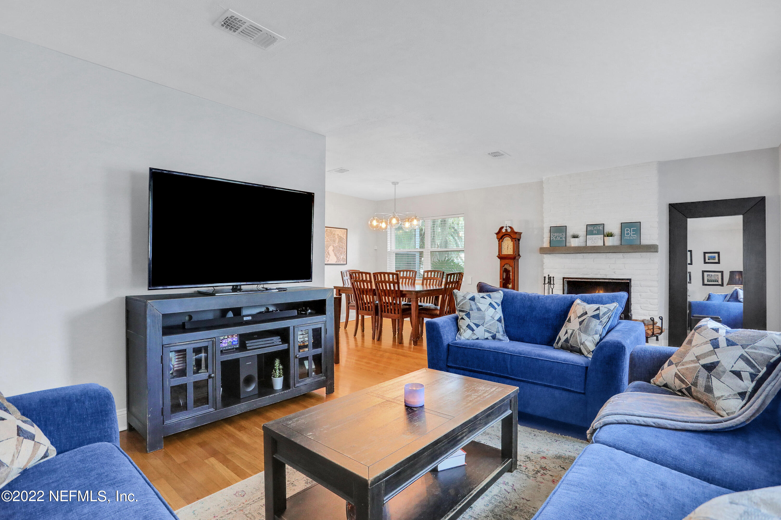 6435 Temple Road Jacksonville, FL 32217 - Photo 8 of 38 a living room with furniture and a flat screen tv