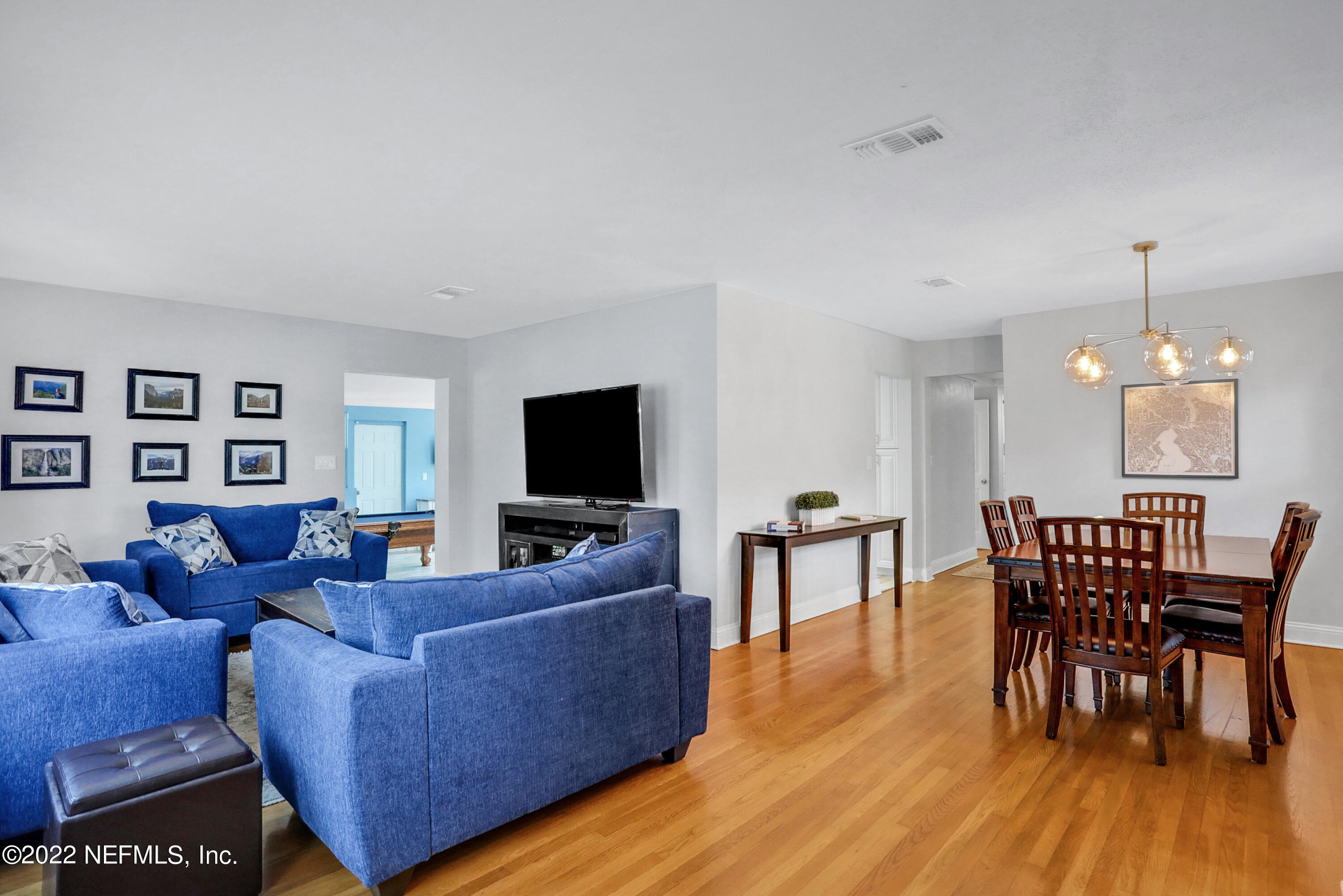 6435 Temple Road Jacksonville, FL 32217 - Photo 10 of 38 a living room with furniture and a flat screen tv