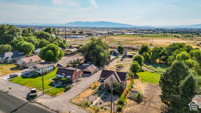 1632 South Main Street Springville, UT 84663 - Photo 90 of 93 Aerial view of residential area featuring a mountain backdrop