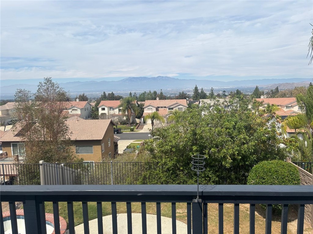 731 Raphael Circle Corona, CA 92882 - Photo 15 of 28 a view of a city from a balcony