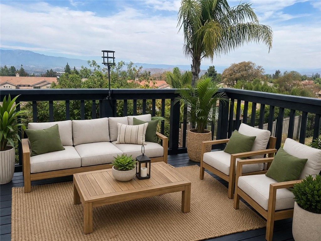 731 Raphael Circle Corona, CA 92882 - Photo 16 of 28 a balcony with furniture and city view