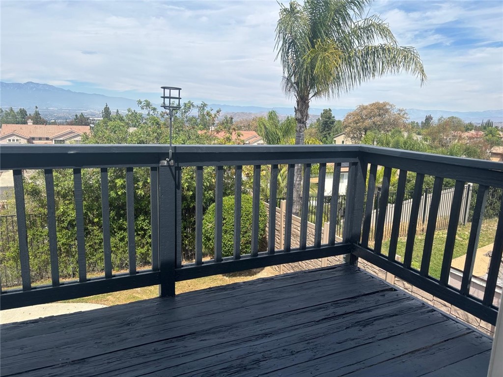 731 Raphael Circle Corona, CA 92882 - Photo 17 of 28 a view of a balcony with wooden floor