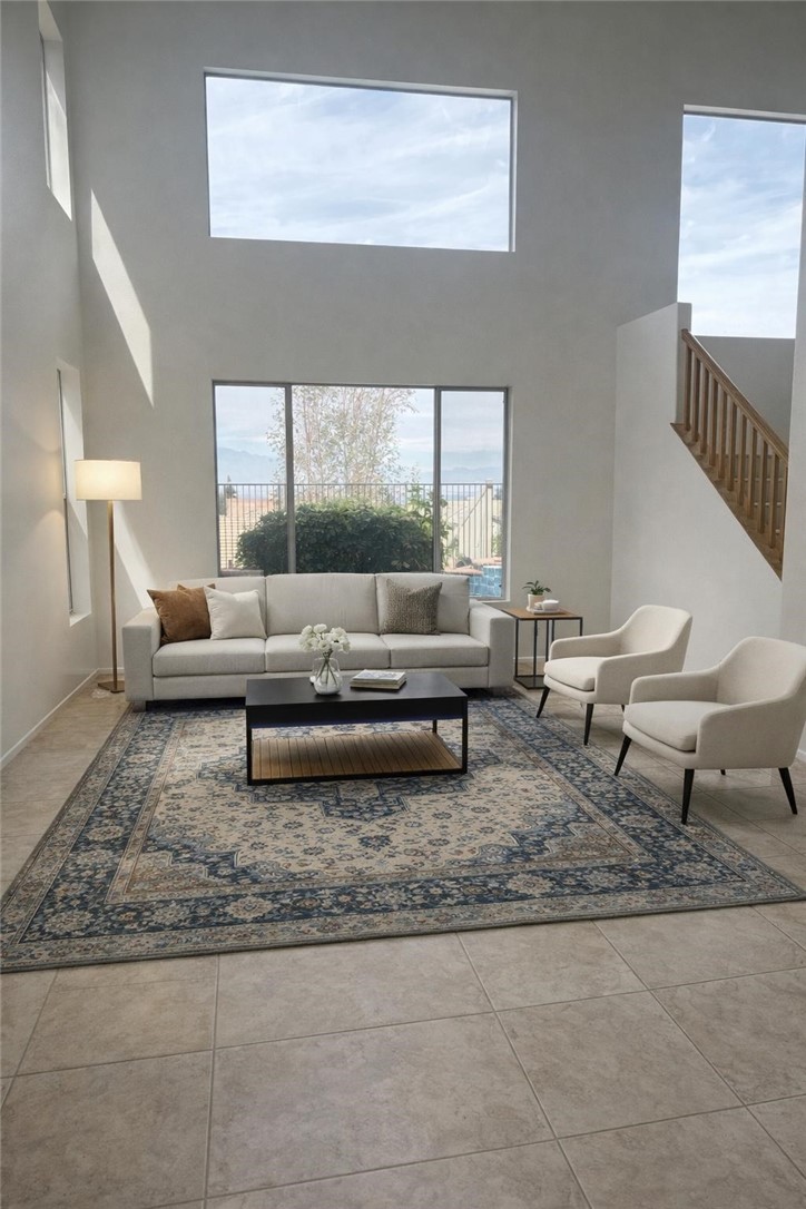731 Raphael Circle Corona, CA 92882 - Photo 2 of 28 a living room with furniture and a rug