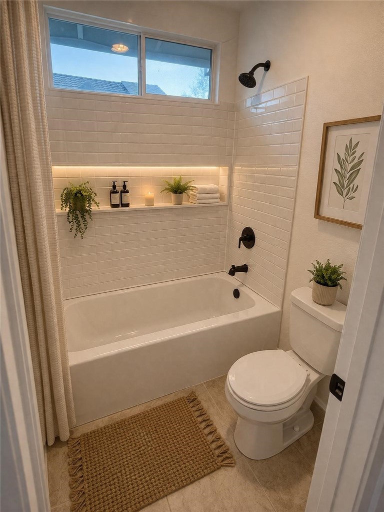 731 Raphael Circle Corona, CA 92882 - Photo 26 of 28 a bathroom with a toilet and a shower