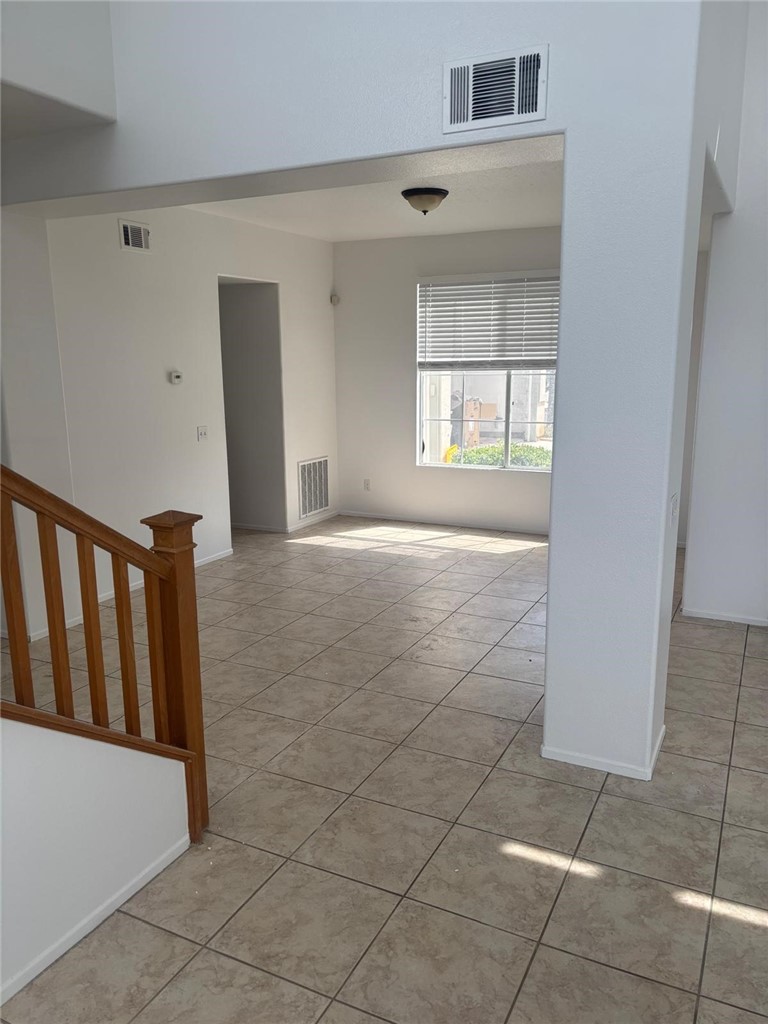 731 Raphael Circle Corona, CA 92882 - Photo 5 of 28 a view of an empty room with a window