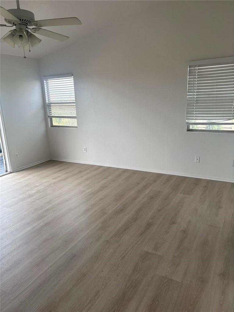731 Raphael Circle Corona, CA 92882 - Photo 7 of 28 an empty room with windows and closet