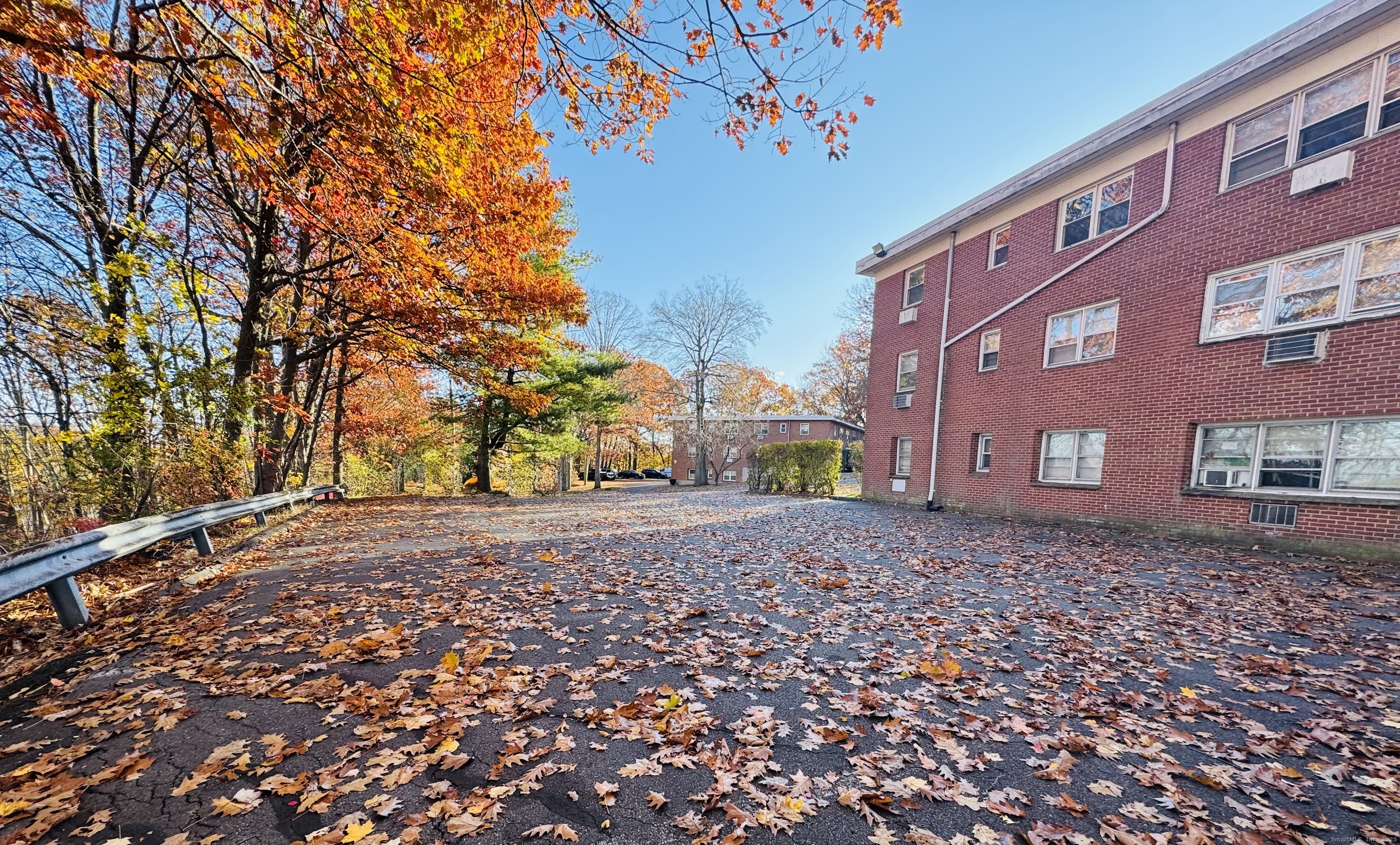 304 Pine Rock Avenue, Unit C15 Hamden, CT 06514 - Photo 13 of 14 a pathway of a house with a yard