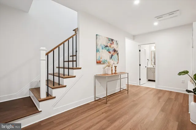 a front view of a house with parking space