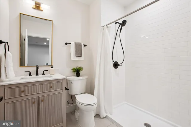 a view of a brick house with a large windows