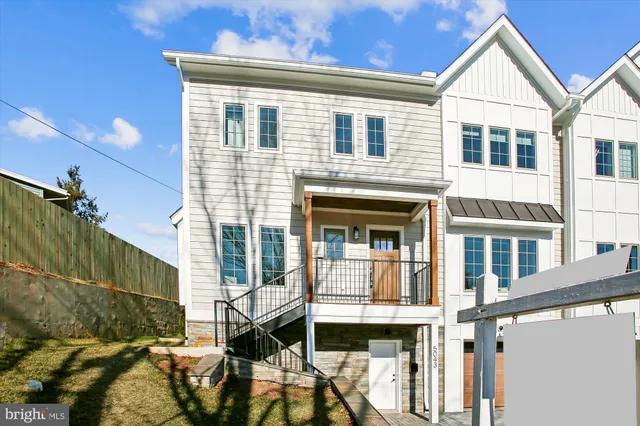 a view of a swimming pool with a yard