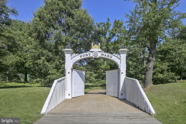 a front view of a building with retail shops