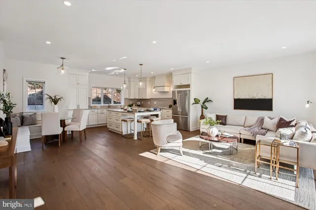 a view of a room with wooden floor and bathroom