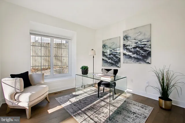 a bedroom with bed and a couch