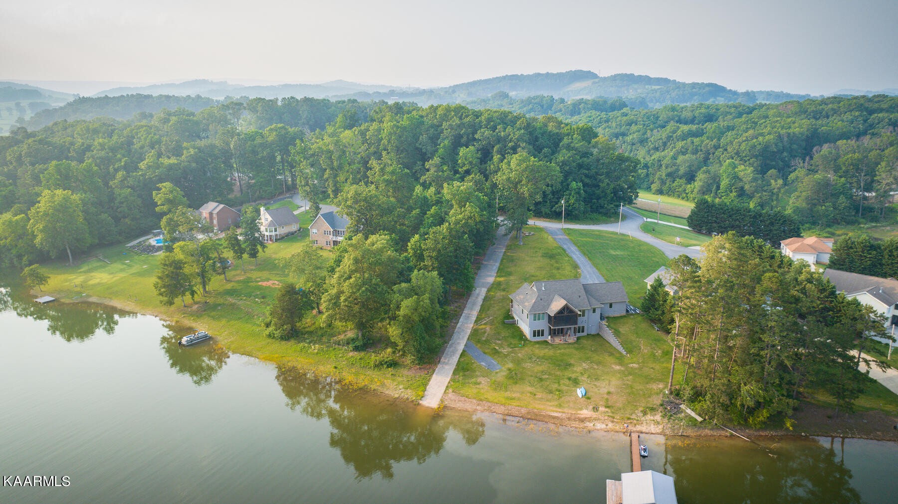 117 Cherokee Cove Rutledge, TN 37861 - Photo 34 of 43 a view of a lake in middle of the town