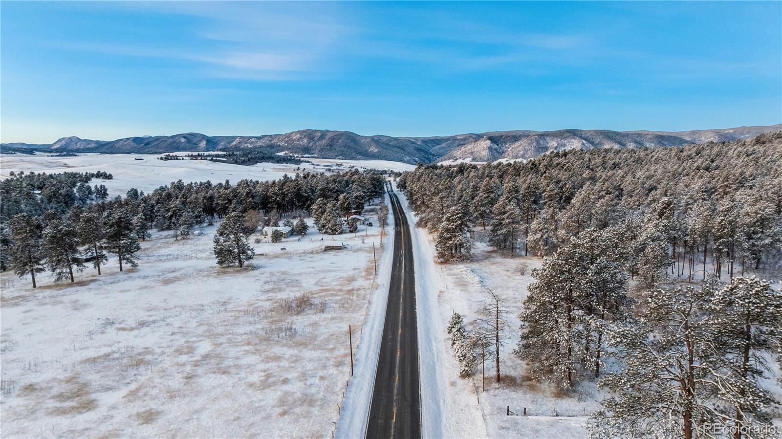 436 West Fox Farm Road Larkspur, CO 80118 - Photo 13 of 50 a view of a terrace with a mountain