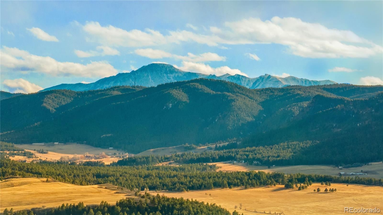 436 West Fox Farm Road Larkspur, CO 80118 - Photo 22 of 50 a view of lake with mountain