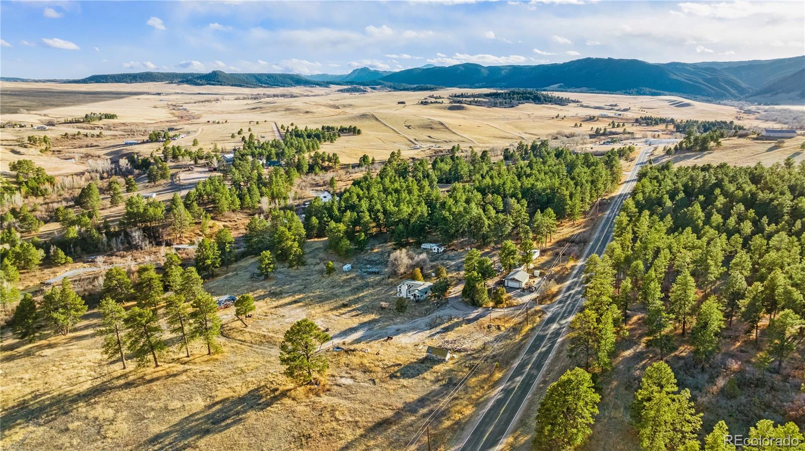 436 West Fox Farm Road Larkspur, CO 80118 - Photo 23 of 50 a view of an ocean and a mountain