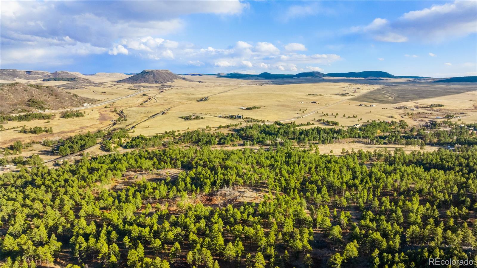 436 West Fox Farm Road Larkspur, CO 80118 - Photo 8 of 50 a view of an ocean and a mountain