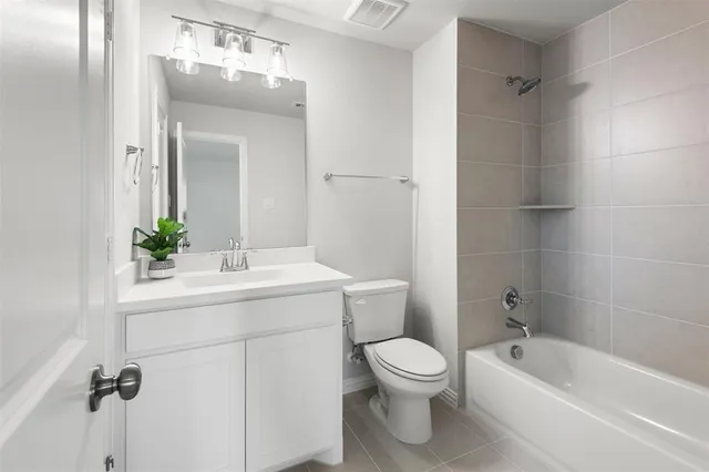 a view of a garden with lawn chairs