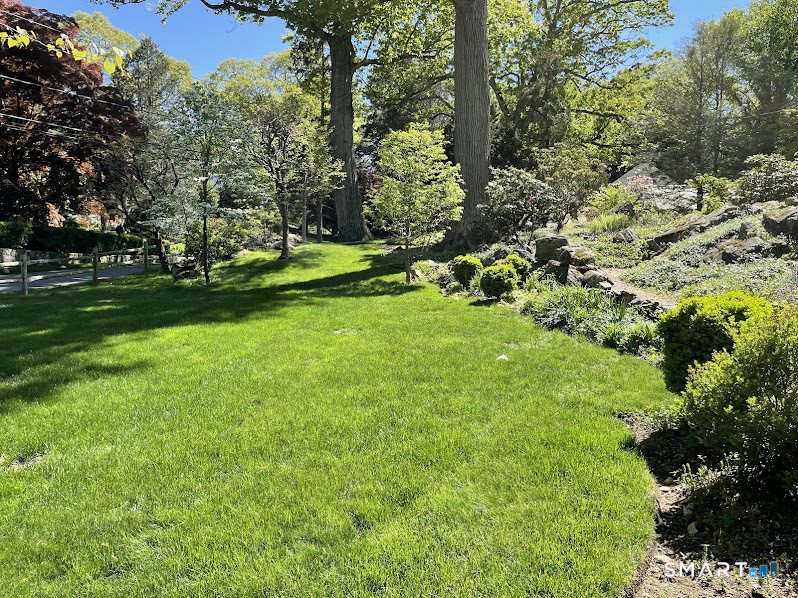 9 Tory Hole Road Darien, CT 06820 - Photo 3 of 33 a view of a park with large trees