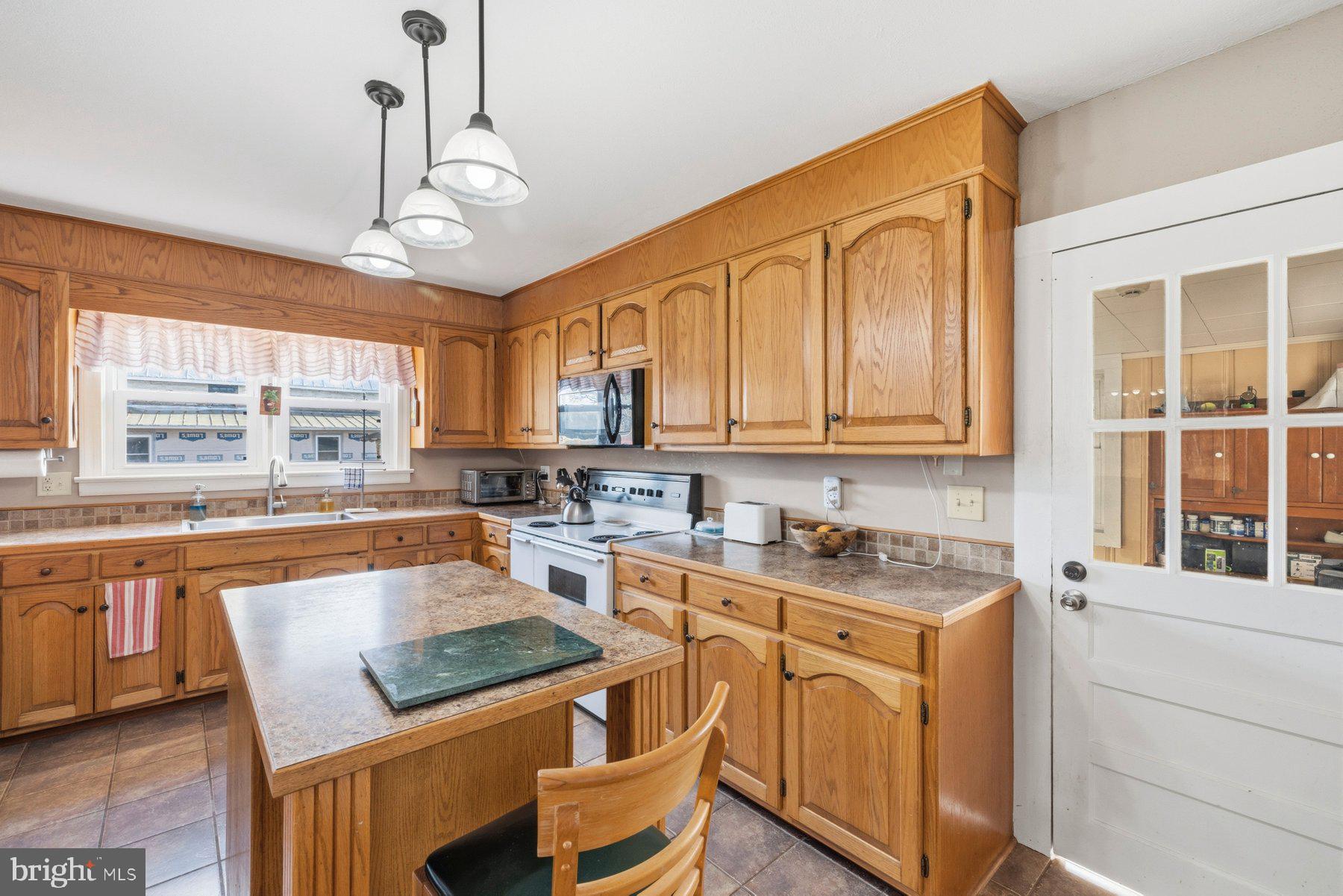2092 Rocksprings Road Ringgold, VA 24586 - Photo 24 of 84 Warm wood tones in a cozy kitchen.