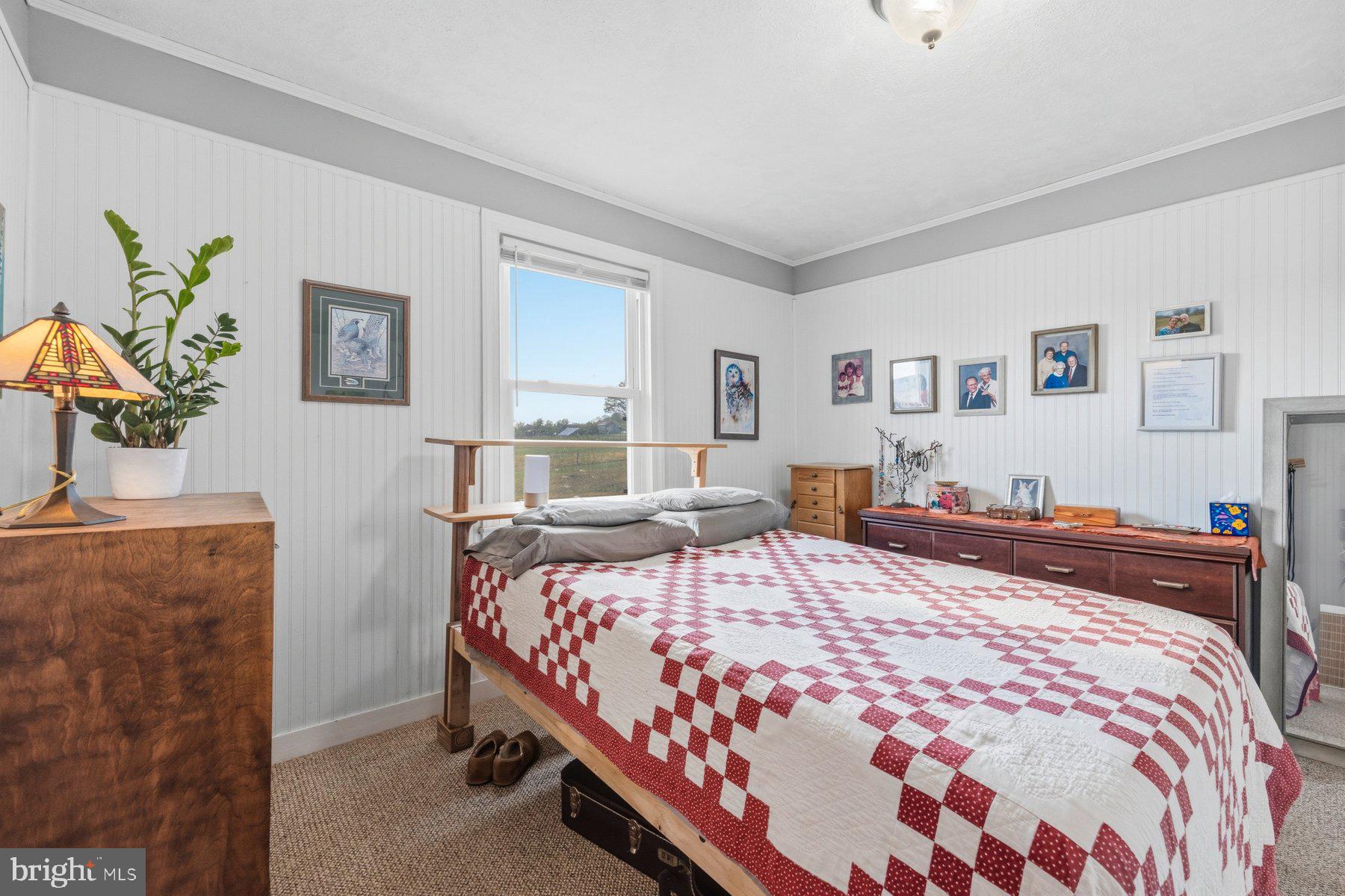 2092 Rocksprings Road Ringgold, VA 24586 - Photo 27 of 84 a bedroom with a bed and a couch